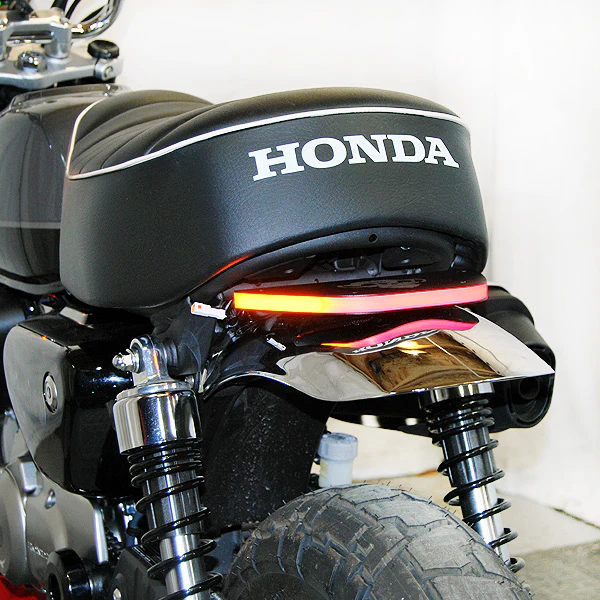 TAIL LIGHT W/LICENSE PLT FRAME SIDE MOUNT HON
